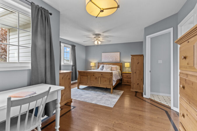 Interior real estate photography example by Show Kingston – bright master bedroom in Kingston, Ontario