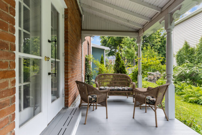 Exterior real estate photography example from Show Kingston – side porch of home in Kingston, Ontario