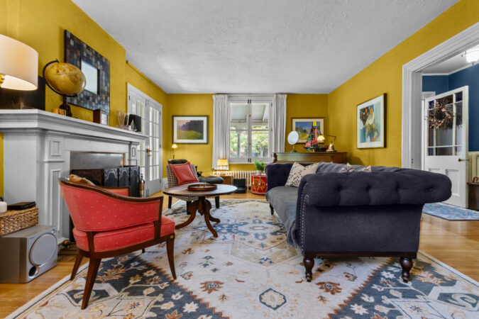 Interior real estate photography example by Show Kingston – colourful large living room in old Kingston, Ontario home.