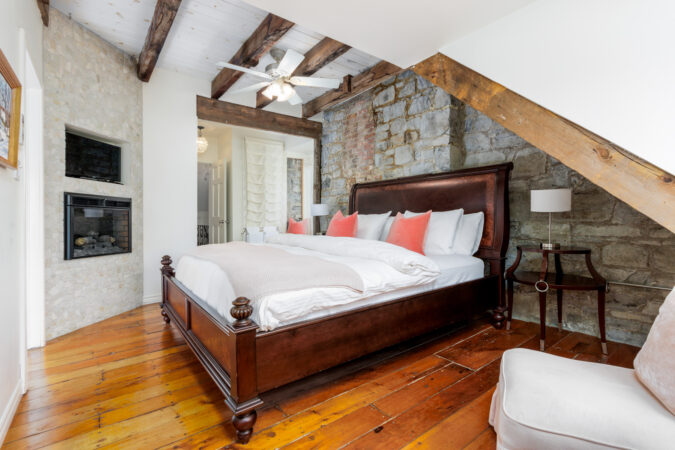 Interior real estate photography example by Show Kingston – large bedroom, Inn near Kingston, Ontario