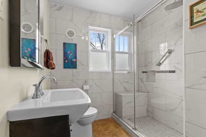 Interior real estate photography example from Show Kingston – 3-piece bathroom near Gananoque, Ontario