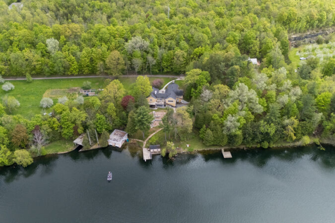 Aerial real estate drone photography example by Show Kingston – lakeside home near Inverary, Ontario