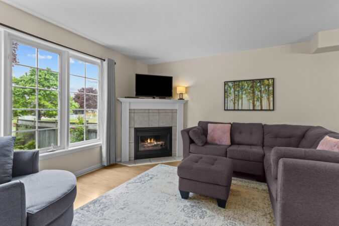 Interior real estate photography example from Show Kingston – bright living room in suburban home Kingston, Ontario
