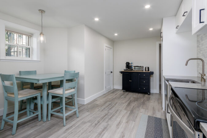 Interior real estate photography example by Show Kingston – kitchen and eating nook in rental property, Kingston, Ontario