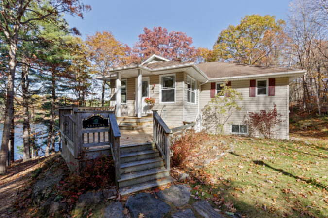 Exterior real estate photography example by Show Kingston - lakeside home near Westport, Ontario