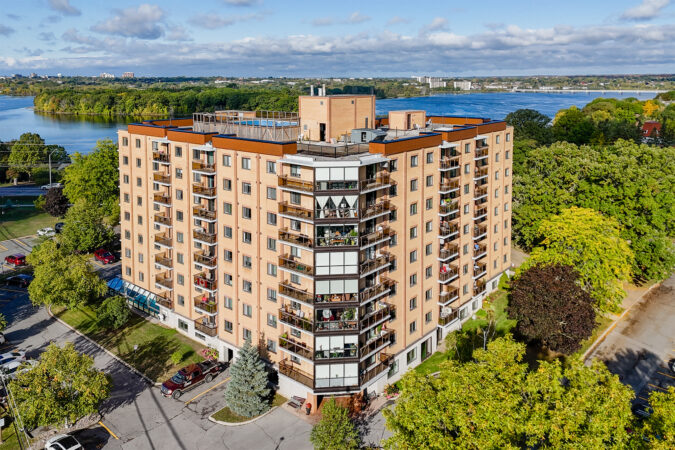 Aerial real estate photography example by Show Kingston – apartment building in Kingston, Ontario
