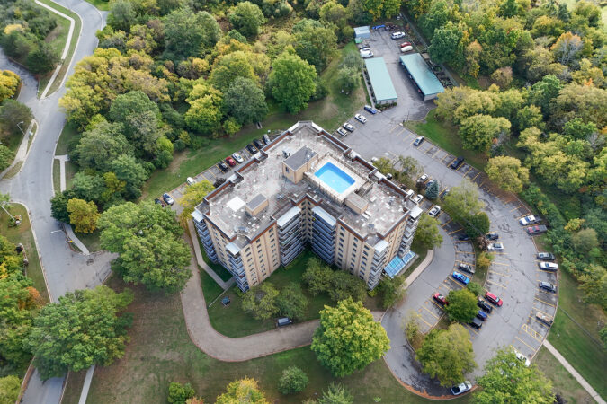 Aerial real estate drone photography example by Show Kingston – apartment building in Kingston, Ontario